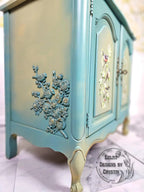 Nestled Whispers Cabinet Table