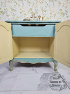 Nestled Whispers Cabinet Table